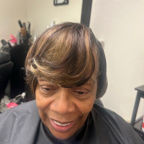 Swoop bang with golden highlights